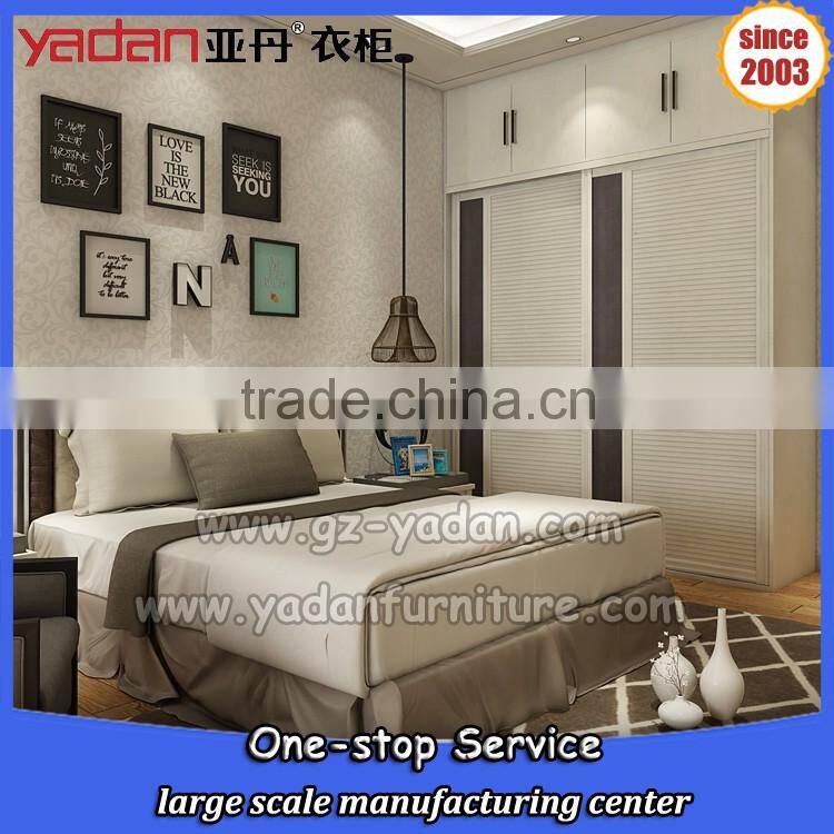 Light color bedroom closet design sliding door wardrobe and bed