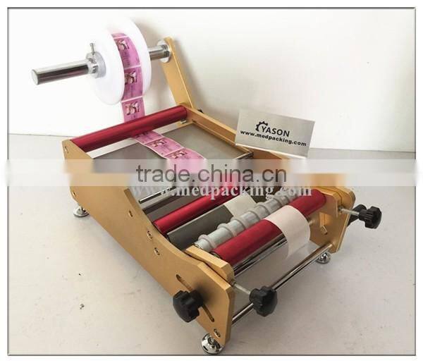 Manual Round Adhesive Bottle Labeling machine,adhesive labeling machine for Round bottle, round jar or cylinder