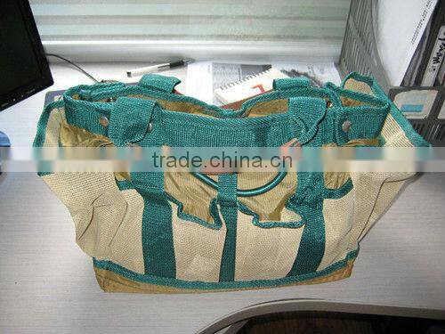 Green and lightgray tool bag with tow handles