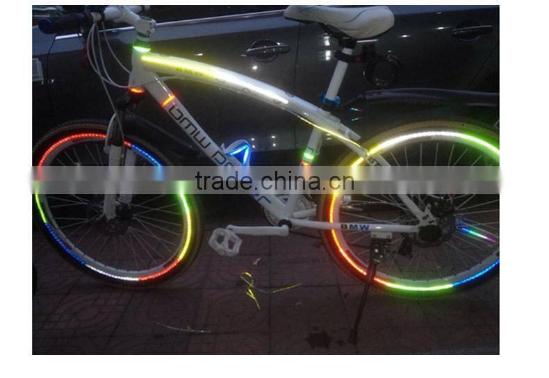 DIY reflective sticker on bike wheel