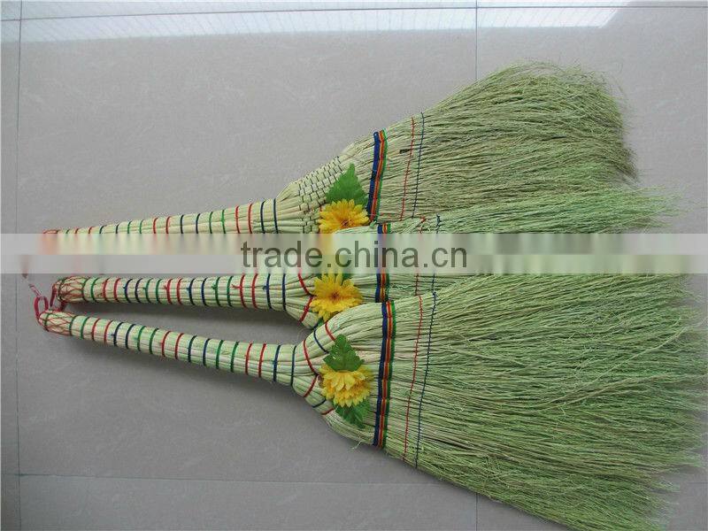 grass broom with short wooden handle