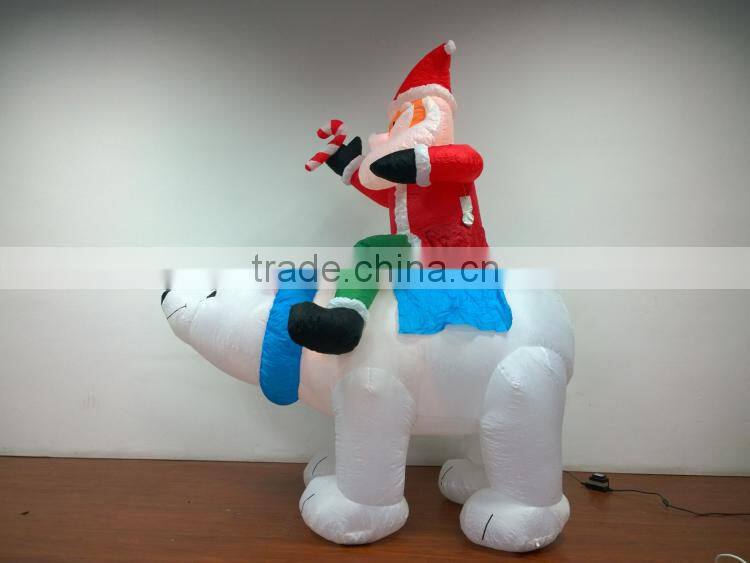 DJ-XT-65 inflatable christmas santa on polar bear with candy airblown music decoration