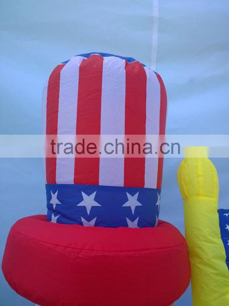 PATRIOTIC INFLATABLE 6' UNCLE SAM HOLDING AMERICAN FLAG WITH BALD EAGLE
