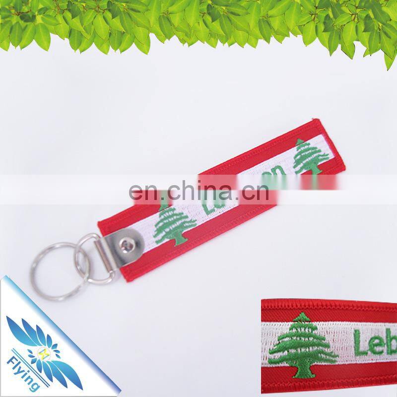 OEM keychain design, bulk cheap custom embroidery key ring with logo, airport fabric keychain for promotion