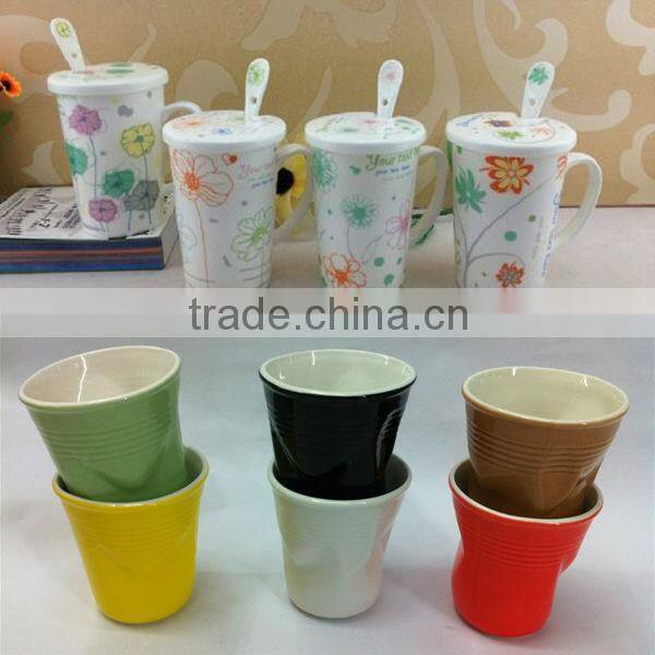 white cheap ceramic coffee cup with spoon