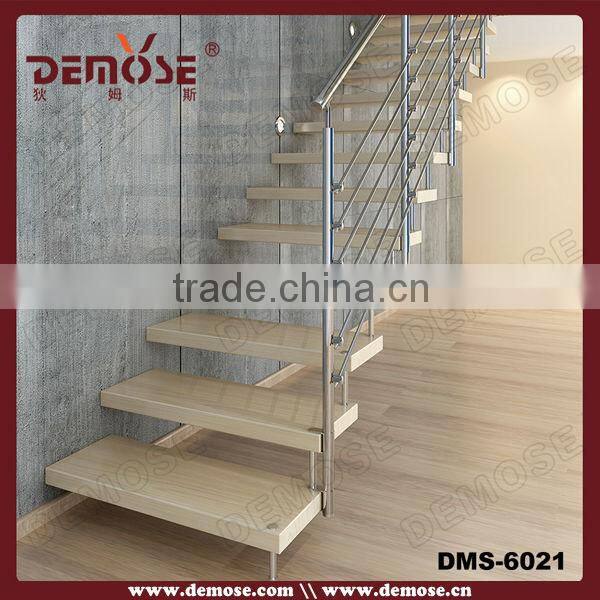 floating wood staircase with frameless glass railings