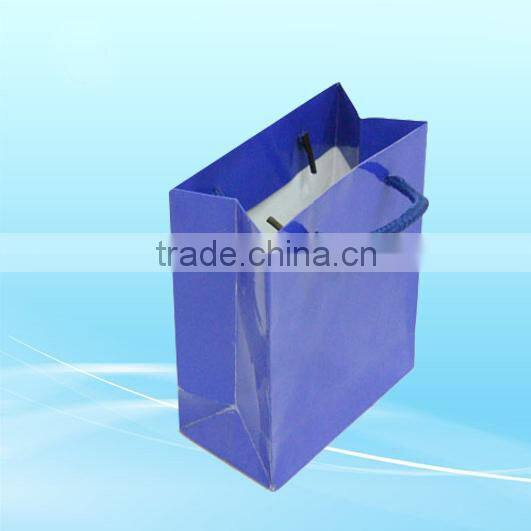 Red shopping paper bags with satin handle