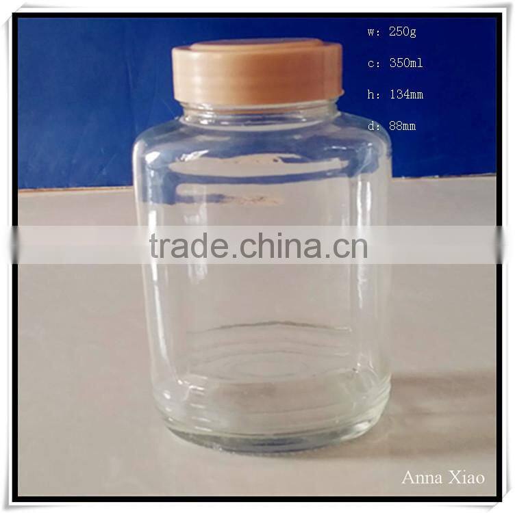 China made 350ml glass honey jars with plastic caps