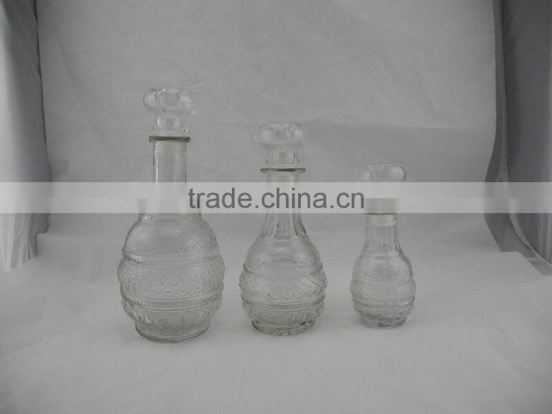 sealed clear glass drinking bottle with glass cork lid