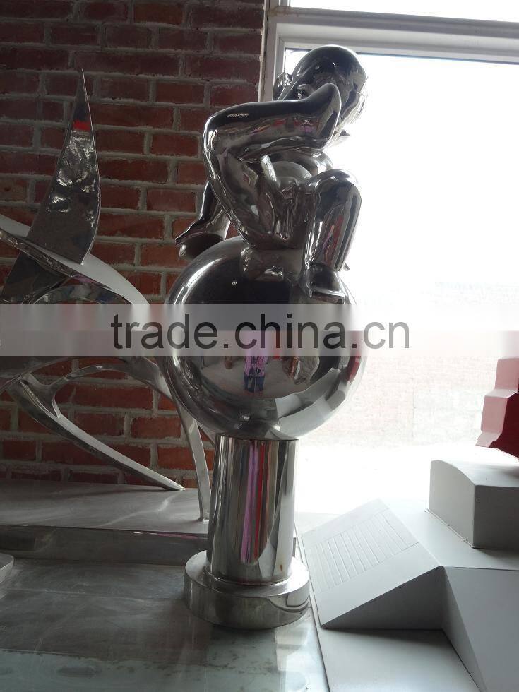 Kids stainless steel sculpture
