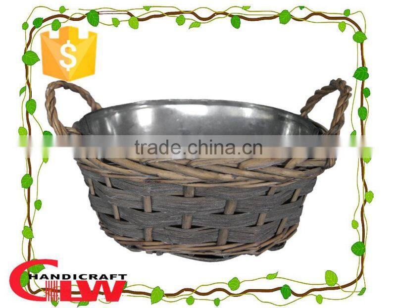 wicker and woodchip garden furniture, plant pot, garden flower basket with round iron bowl inside