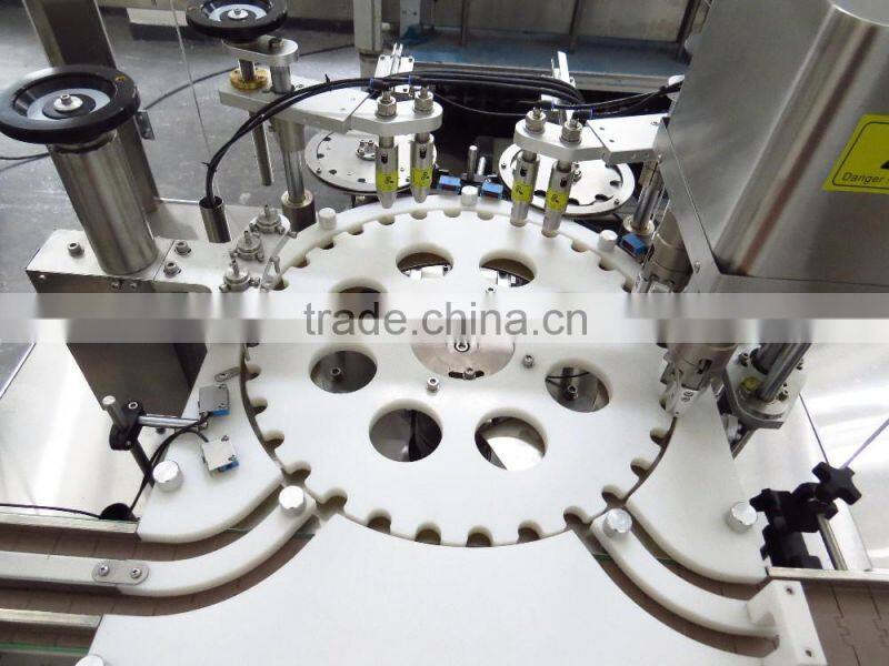 DTNX-60Y Mechanical Hand Duel Lines Eye Drop Filling, Plugging And Capping Machine