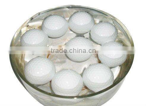 white color floating golf ball