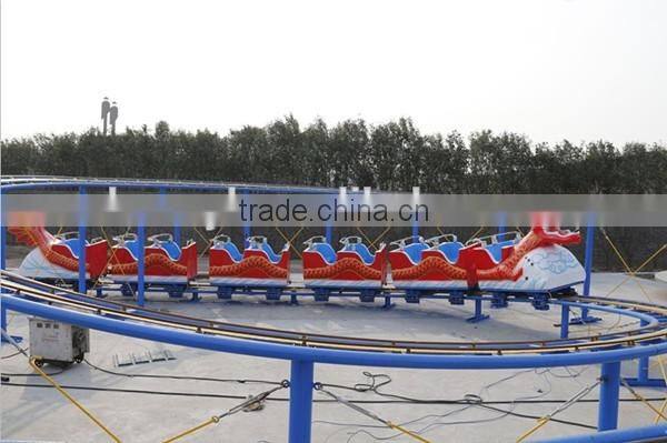 Kids large amusement rides mini roller coaster , sliding dragon / green worm mini roller coaster rides hot sale