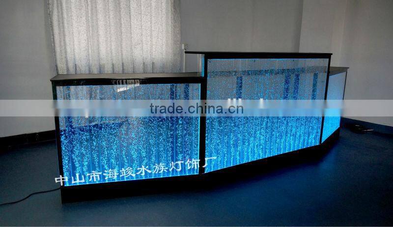 fatastic hotel frond desk receiption with led lights and water bubble moving.