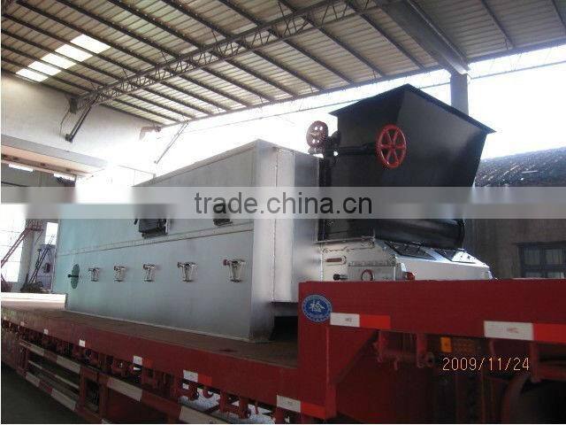 Reciprocating grate hot air generator