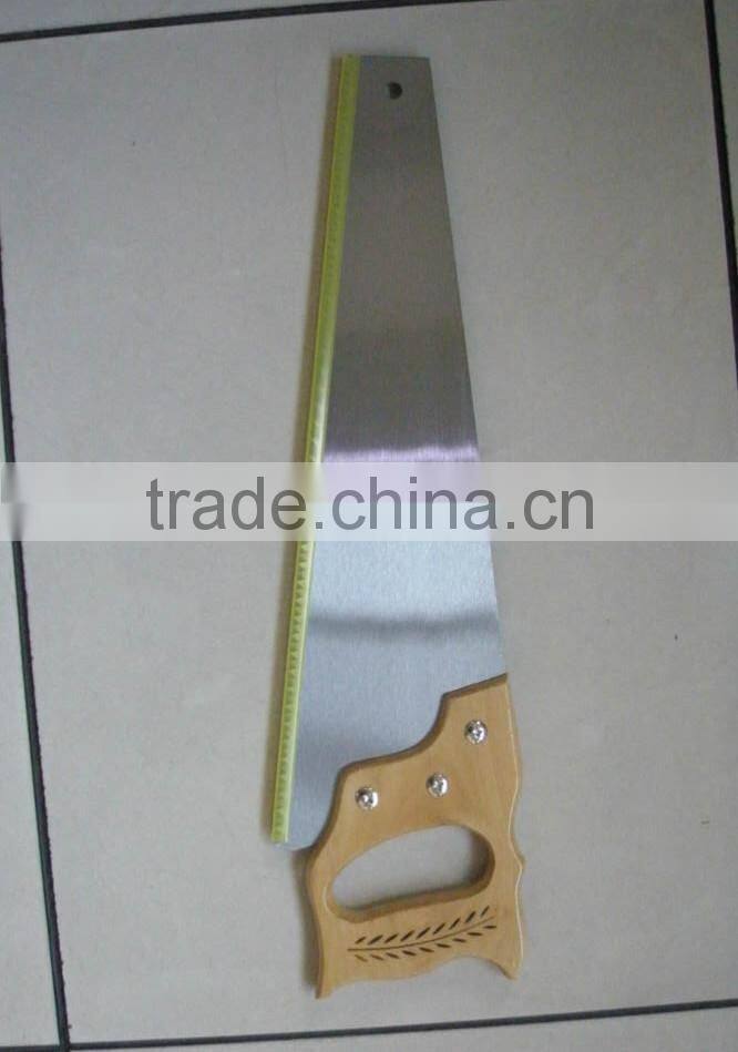 Garden cutting tools Hand saw cutting tree or branch