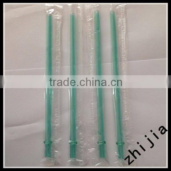 Clear wrapped red plastic drinking straw