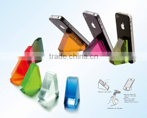 Multifunctional sticker with pen/mobile phone holder