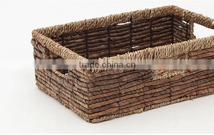 Natural seagrass and banana leaf interwoven storage basket