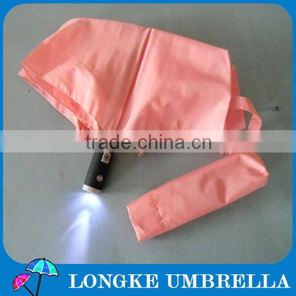 3 fold auto open and close pink color umbrella with torch handle/LED umbrella