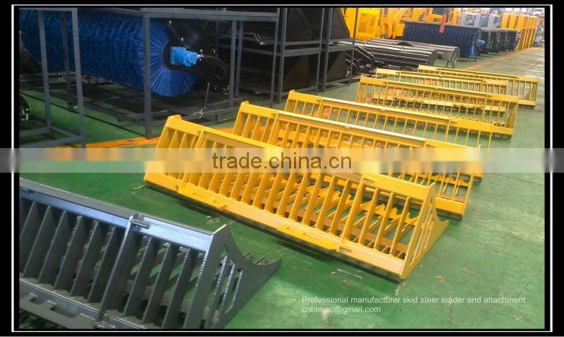 skid steer loader with rock grapple