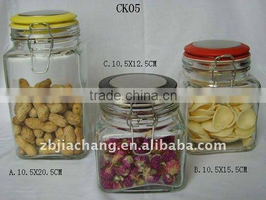 Square glass jar used for storage jam with clamp