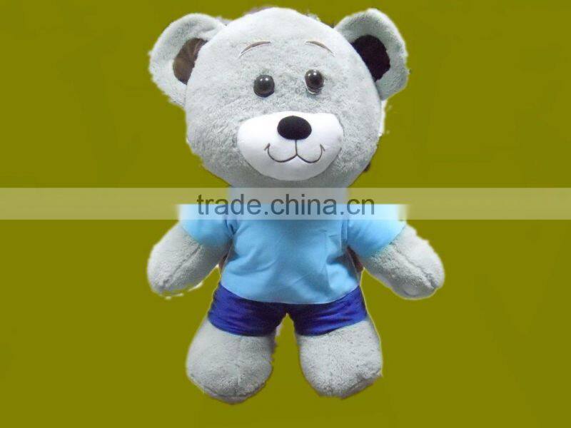 pretty plush bear holding heart