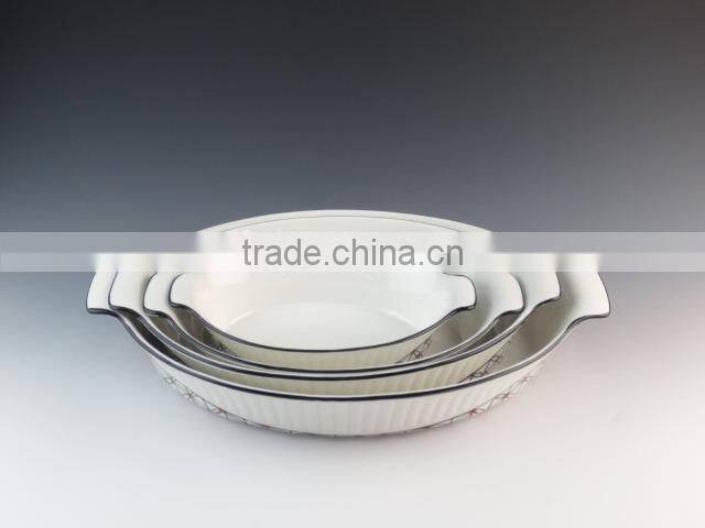 White oval shape ceramic bakeware porcelain bake plate with hands in stocklots
