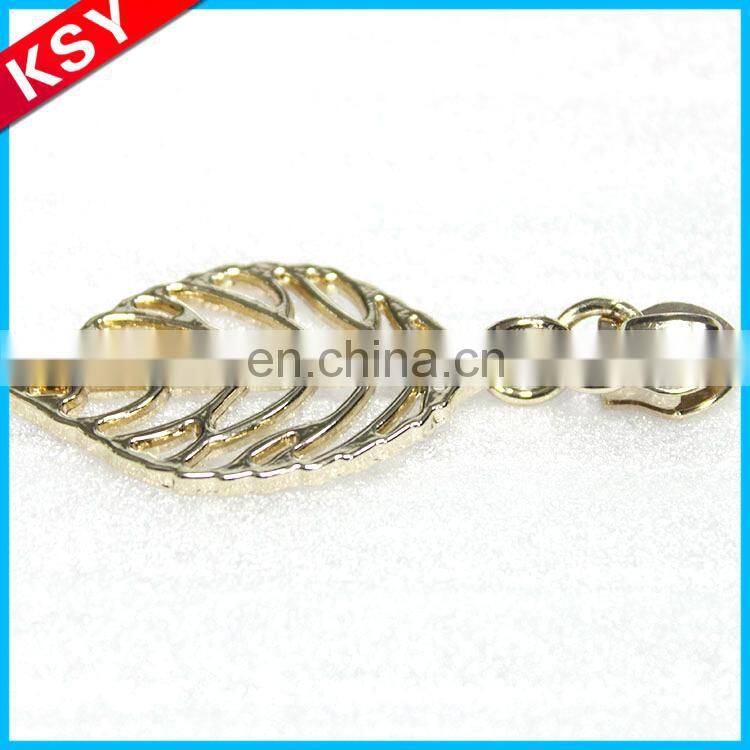 Custom zipper head with metal logo