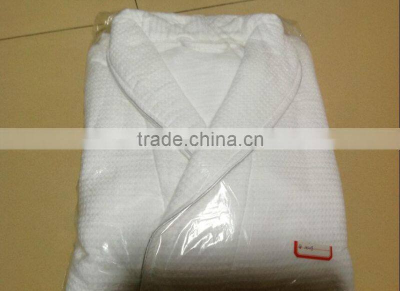 Golden hotel bathrobe