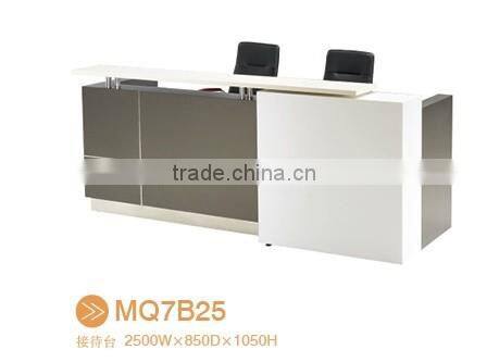 Black tufted reception desk made with tempered glass