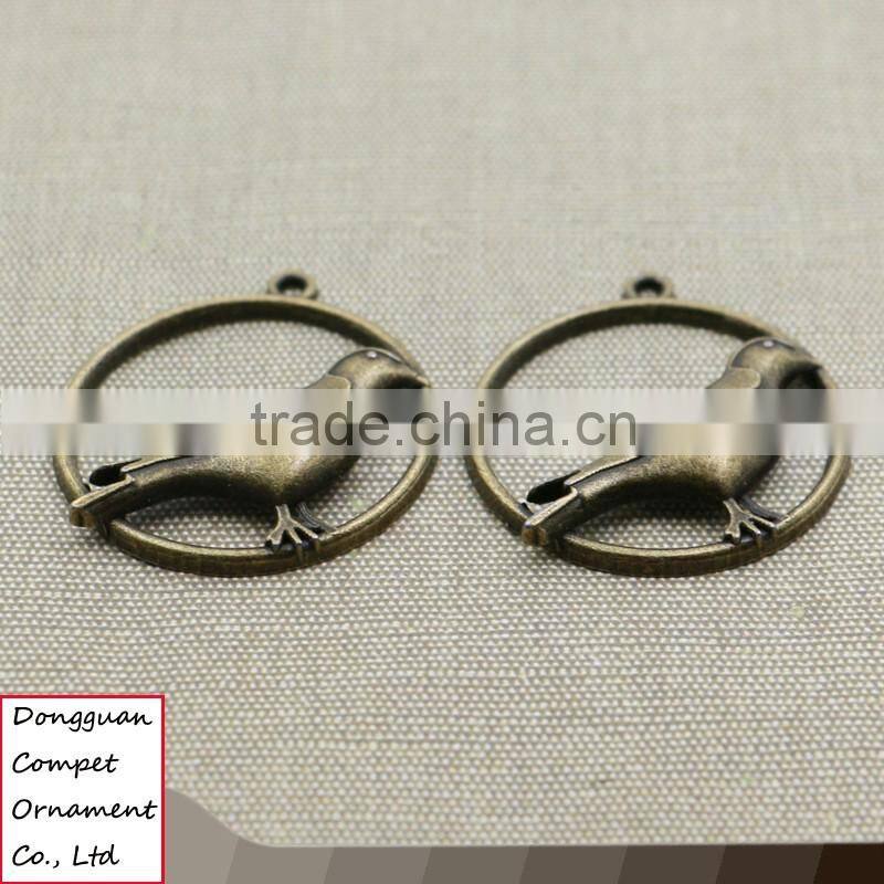 Wholesale metal plating zinc alloy hollow out cuckoo bird pendant