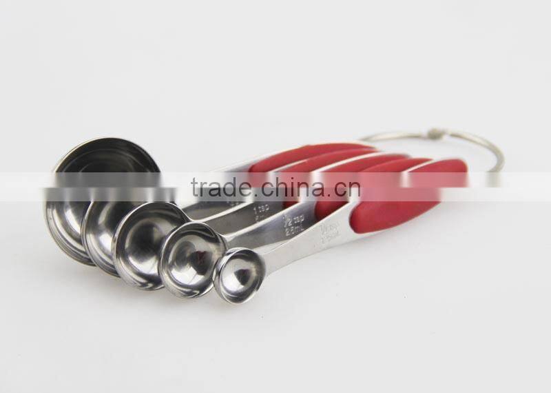 Measure spoon with silicone handle