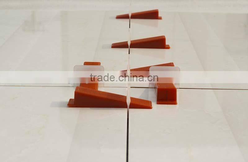 Plastic medium tile leveling system