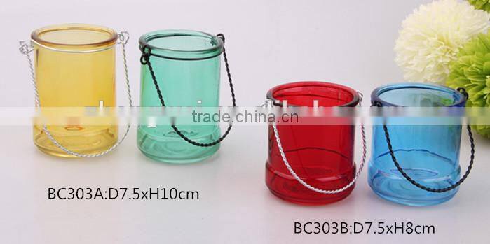 colorful glass candle holder with metal lifting handle