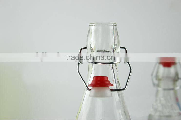 glass milk juice bottle with metal clamp lid and woven belt coating