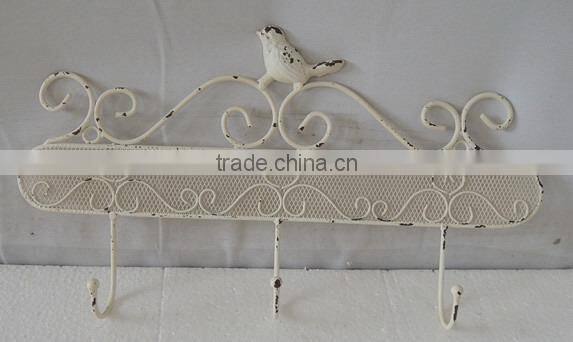 Distressed white metal iron bird hooks