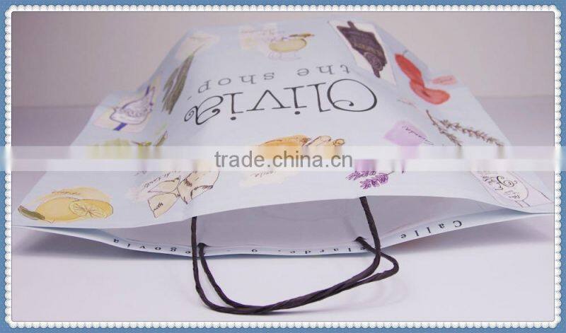 Colorful printed new style white kraft paper bag with black twisted handle for costemic