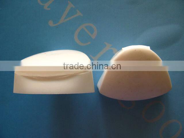 White plastic shampoo bottle caps