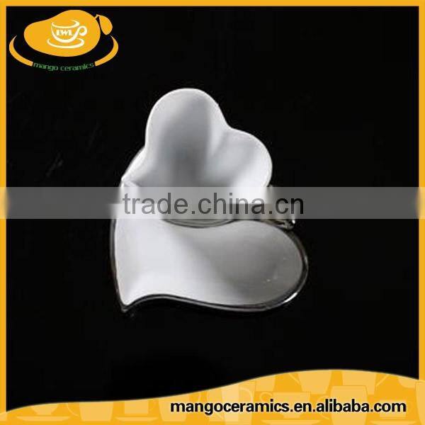 Romantic heart shape white porcelain coffee cup and saucer