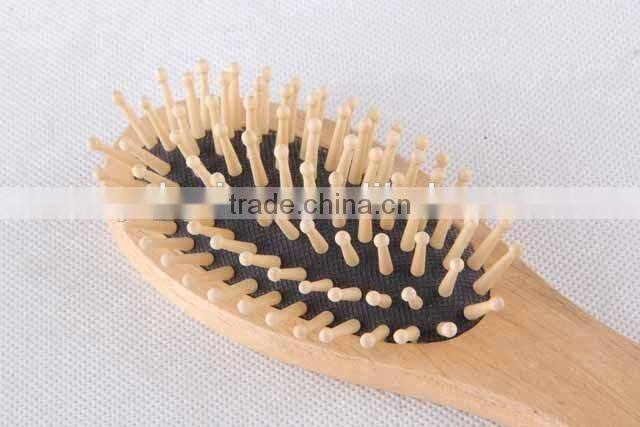 Elastic massage wooden comb with hanging hole/hair brush
