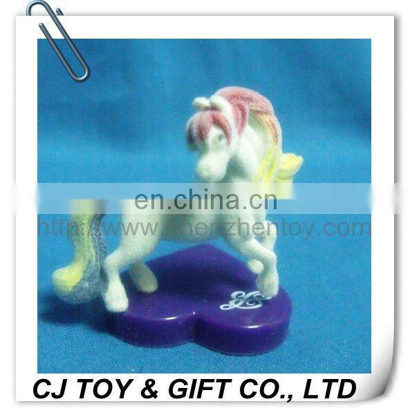 toy horse flocked