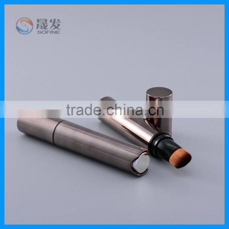 Cosmetic packaging tube with brush head