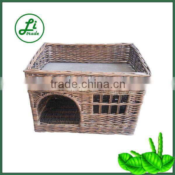 lovely double decker wicker dog house