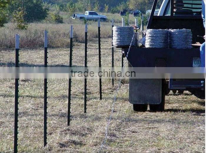 green painted farm fencing used t bar fence post