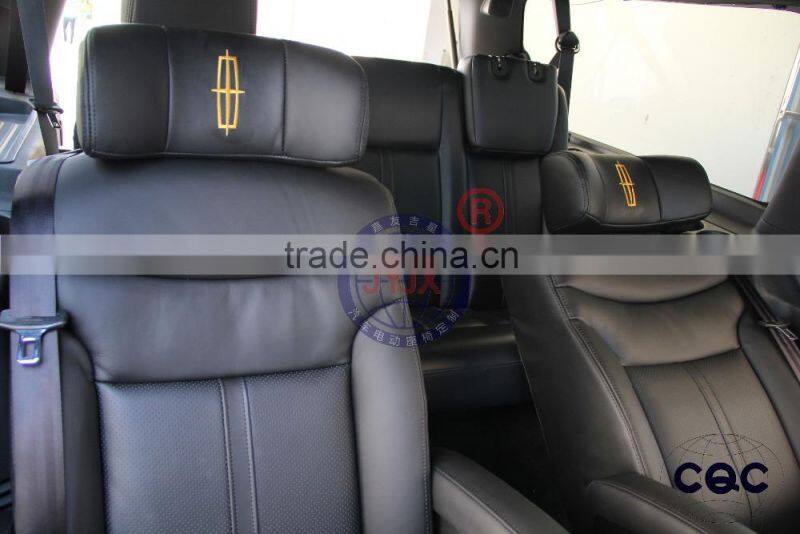 Lincoln Navigator pilot electric chair modification Lincoln navigator interior refitting middle seat electric