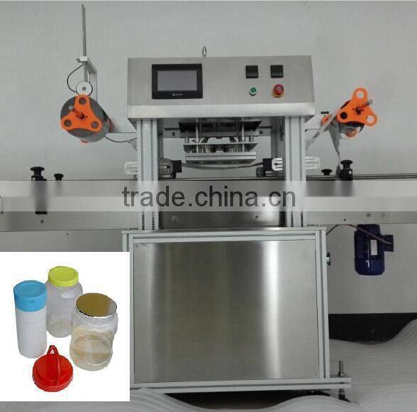 Cosmetic powder plastic jar heat cutting and sealing film machine
