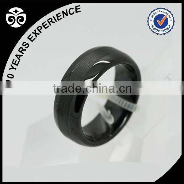 Wood ceramic ring with carbon fiber inlay