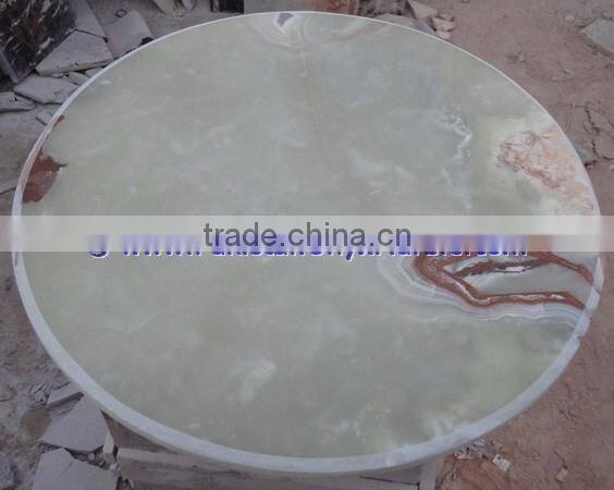 A GRADE LIGHT GREEN ONYX TABLE TOPS COLLECTION